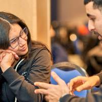 International Anchor Allies Winter 2026 First Mixer - A male student making a point to another student